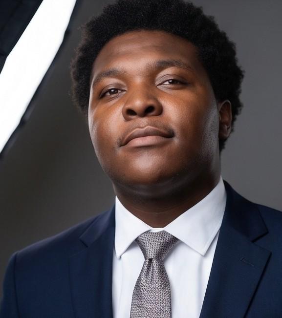 D'Onthony Johnson in a navy suit
